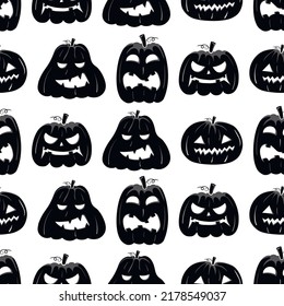 Seamless pattern with black silhouette of a pumpkin face for halloween on a white background.