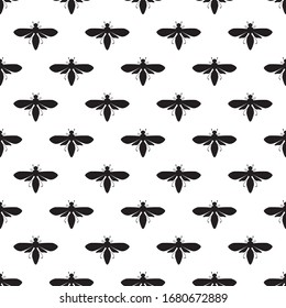 Seamless pattern of black silhouettes of bees isolated on the white background. Vector insects pattern in black and white style. Designs for fabric, wallpaper, home design, wrapping paper.