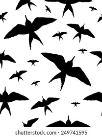 Seamless pattern with black silhouettes of birds on white, vector illustration