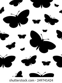 Seamless pattern with black silhouettes of butterflies on white, vector illustration