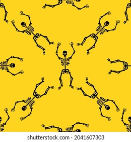 Seamless pattern with black skeletons, dancing and having fun on a yellow background.
