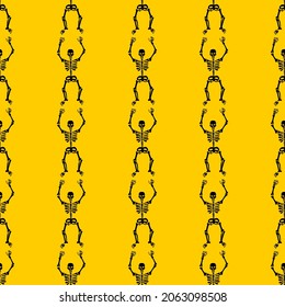 Seamless pattern with black skeletons, dancing and having fun on a yellow background.