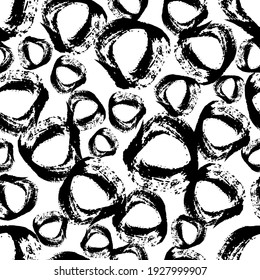 Seamless pattern with black sketch hand drawn brush scribble circles shape on white background. Abstract grunge texture. Vector illustration