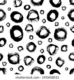 Seamless pattern with black sketch hand drawn brush scribble circles shape on white background. Abstract grunge texture. Vector illustration