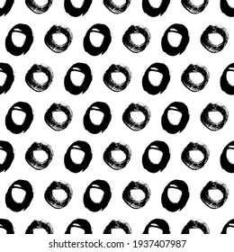 Seamless pattern with black sketch hand drawn brush scribble circles shape on white background. Abstract grunge texture. Vector illustration