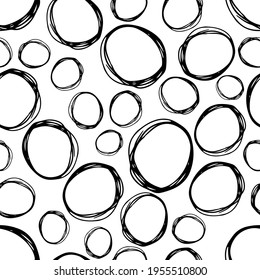Seamless pattern with black sketch hand drawn brush scribble circles shape on white background. Abstract grunge texture. Vector illustration