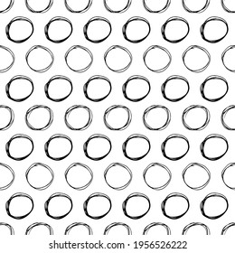 Seamless pattern with black sketch hand drawn brush scribble circles shape on white background. Abstract grunge texture. Vector illustration