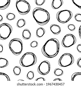 Seamless pattern with black sketch hand drawn brush scribble circles shape on white background. Abstract grunge texture. Vector illustration
