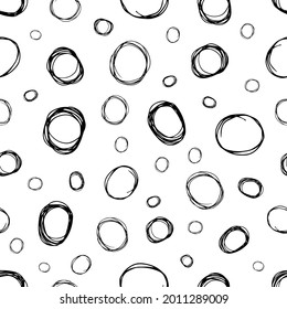 Seamless pattern with black sketch hand drawn brush scribble circles shape on white background. Abstract grunge texture. Vector illustration