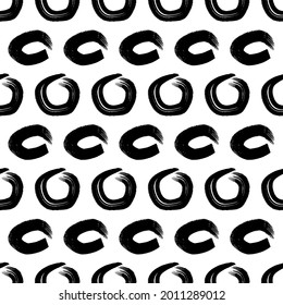 Seamless pattern with black sketch hand drawn brush scribble circles shape on white background. Abstract grunge texture. Vector illustration