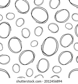 Seamless pattern with black sketch hand drawn brush scribble circles shape on white background. Abstract grunge texture. Vector illustration