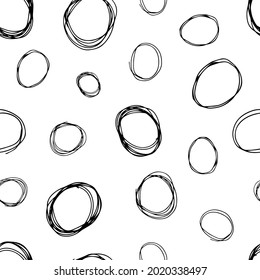 Seamless pattern with black sketch hand drawn brush scribble circles shape on white background. Abstract grunge texture. Vector illustration