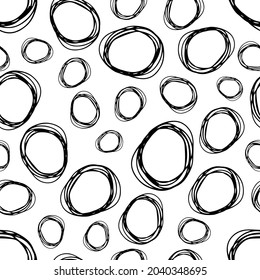 Seamless pattern with black sketch hand drawn brush scribble circles shape on white background. Abstract grunge texture. Vector illustration