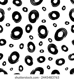 Seamless pattern with black sketch hand drawn brush scribble circles shape on white background. Abstract grunge texture. Vector illustration