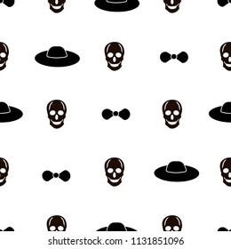Seamless pattern with black skulls on the white background. Vector illustration