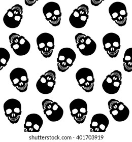 seamless pattern black skulls on a white background.
