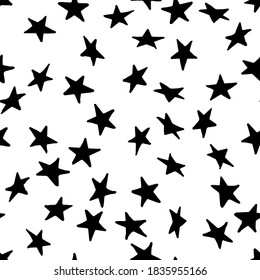 Seamless pattern with black stars on white background. Vector design for textile, backgrounds, clothes, wrapping paper, web sites and wallpaper. Fashion illustration hand drawn seamless pattern.