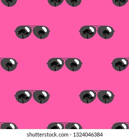 Seamless pattern with black sunglasses icons on pink background