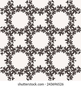 Seamless pattern with black textured leaves on white background