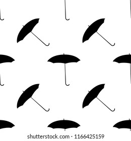 seamless pattern with the black umbrellas on white background
