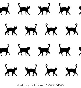 Seamless pattern with black walking cats. Endless monochrome backdrop for World Cat Day. Kittens on a white background. Vector illustration.