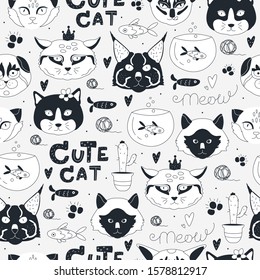 Seamless pattern with black and white cats 