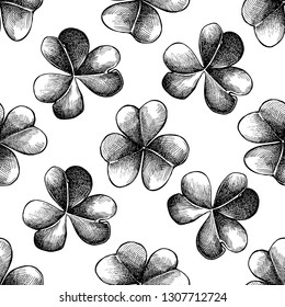 Seamless pattern with black and white clover