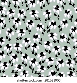 Seamless pattern with black and white ditsy flowers. Endless background with small flowers in achromatic colors.
