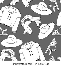 seamless pattern in black and white, with drawings of clothes and shoes