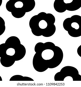 Seamless pattern with black and white flowers background. Vector hand drawn style.
