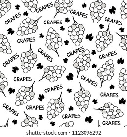 Seamless pattern with black and white grapes and words grapes on the white background. Vector illustration
