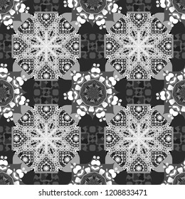 Seamless pattern in black, white and gray colors. Vector background with tiles and rhombus. Vector geometrical seamless ornament.