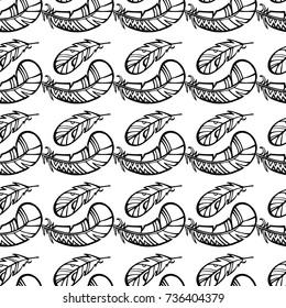 Seamless pattern black and white with hand-drawn feathers. Vector illustration. White background.