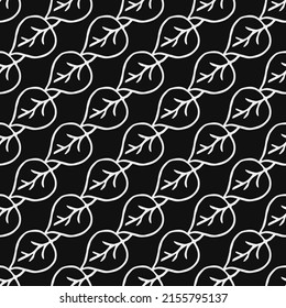 seamless pattern with black and white leaves. black and white on the black background