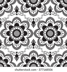 Seamless pattern with black and white mehndi lace of flower buta decoration items on white background. Vector  floral wedding decorative elements isolated. 