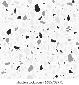 Seamless pattern with black and white terrazzo pieces 