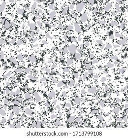 Seamless pattern with black and white terrazzo pieces.