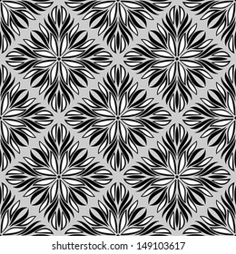 Seamless pattern with black and white tracery on a gray background