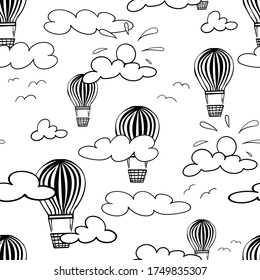 Seamless pattern. Black and white vector illustration. White background. Drawing from clouds, the sun, a balloon, birds in a black outline. Cartoon style.