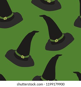Seamless pattern black witch hats on green background