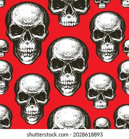 Seamless pattern with black-white skulls on a red backdrop. Vector background with hand-drawn human skulls. Graphic print for clothes, fabric, wallpaper, wrapping paper, halloween party design element