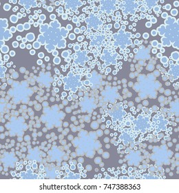 Seamless pattern. Blizzard. Individual snowflakes are viewed. Five-color palette.