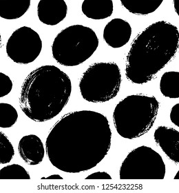 Seamless pattern with blots, circles and ovals. Simple vector geometric texture. Modern monochrome texture. Hand drawn ornament for wrapping paper, wallpapers, web design etc.