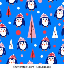 Seamless pattern with blue baby penguins wearing pink, red and white hats. White background. Fir trees and snow. Cute and funny. Merry Christmas. Wallpaper, textile, scrapbooking and wrapping paper