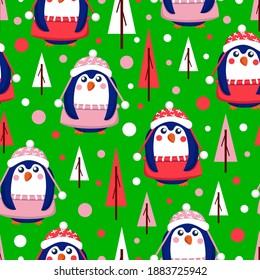 Seamless pattern with blue baby penguins wearing pink, red and white sweaters, hats and skirts. Green background. Fir trees. Merry Christmas. Wallpaper, textile, scrapbooking and wrapping paper