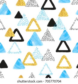Seamless pattern with blue, black and golden triangles. Vector abstract background with geometric shapes.
