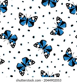 Seamless pattern with blue butterflies on dotted background. Hand drawn vector illustration. Texture for print, textile, fabric, packaging.