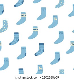Seamless pattern of blue Christmas socks on white background. Doodle style. Christmas winter background. Vector illustration