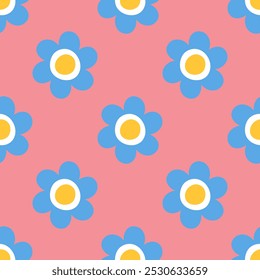 Seamless pattern with blue daisy flowers on pastel pink background. Cute childish style. Minimalist background for textile, fabrics, baby clothes, wallpapers