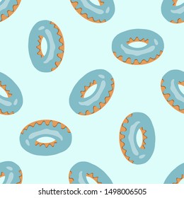 Seamless pattern with blue donuts for fabric, wallpaper, textile, tableclothes, web design.